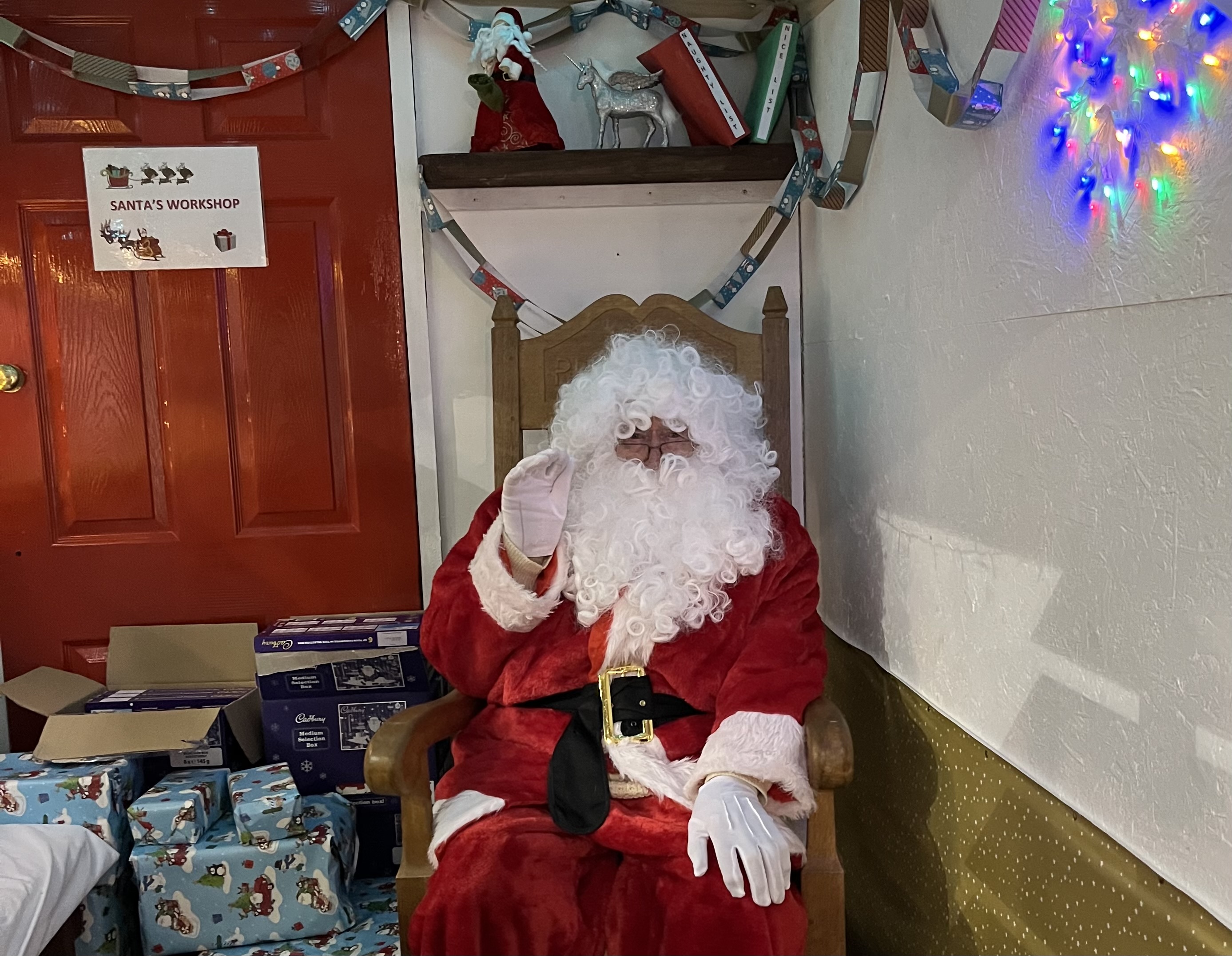 santa-in-his-grotto-at-the-christmas-fair.jpg