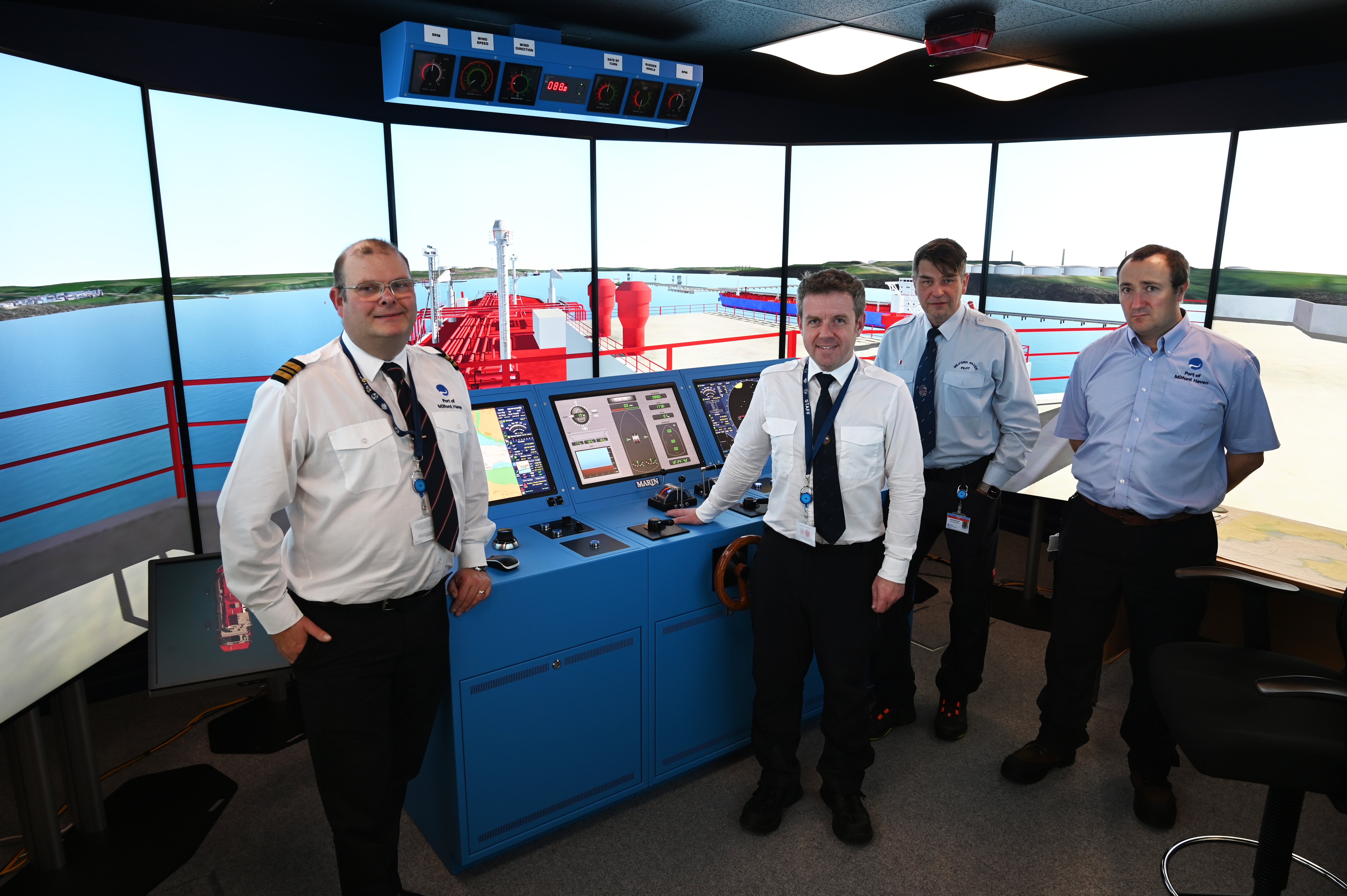 port-staff-david-lockwood-assistant-harbourmaster-captain-ewan-mcnicoll-pilot-captain-andrzej-ostrowski-pilot-and-alex-brown-ict-manager-have-been-instrum.jpg